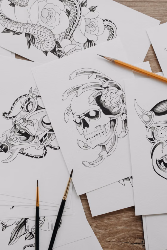 Planche de flash : crânes et fleurs (tatouage illustratif)